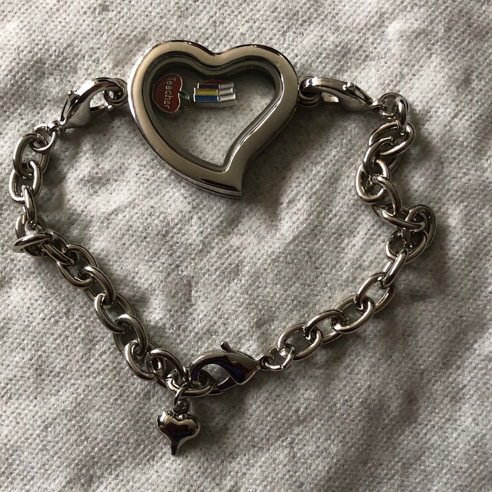 Heart-Shaped Silver Bracelet with teacher charms.